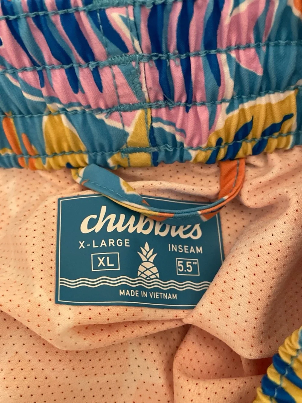 chubbies Colorful Tropical Fish Swim Trunks in Blue, Orange & Pink